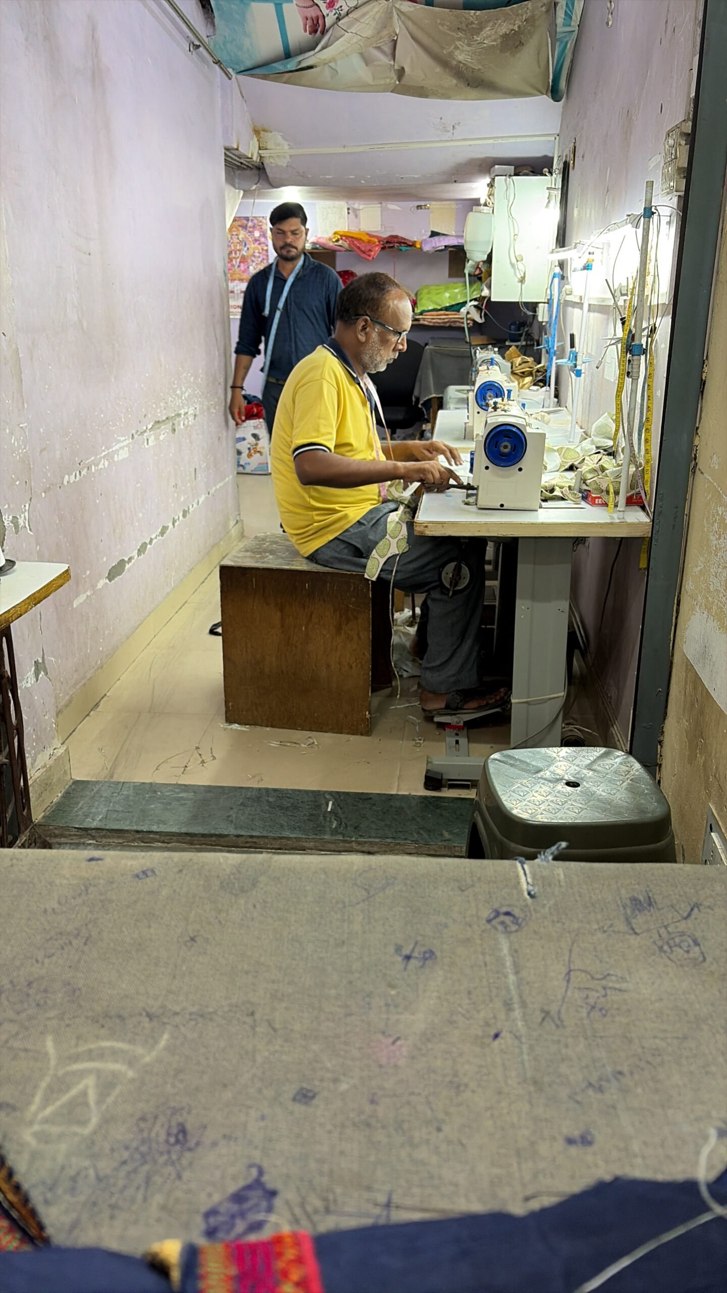 Garment makers working in a sewing studio